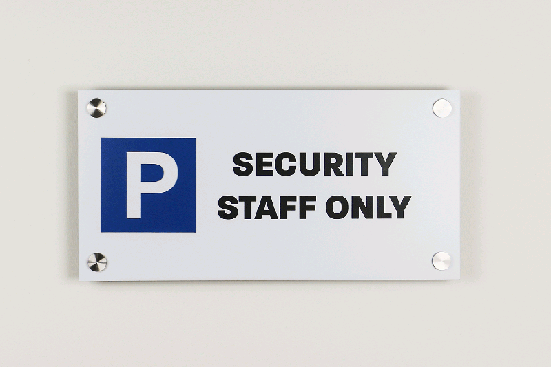 laser cut and laser engraved parking sign made out of TroLase