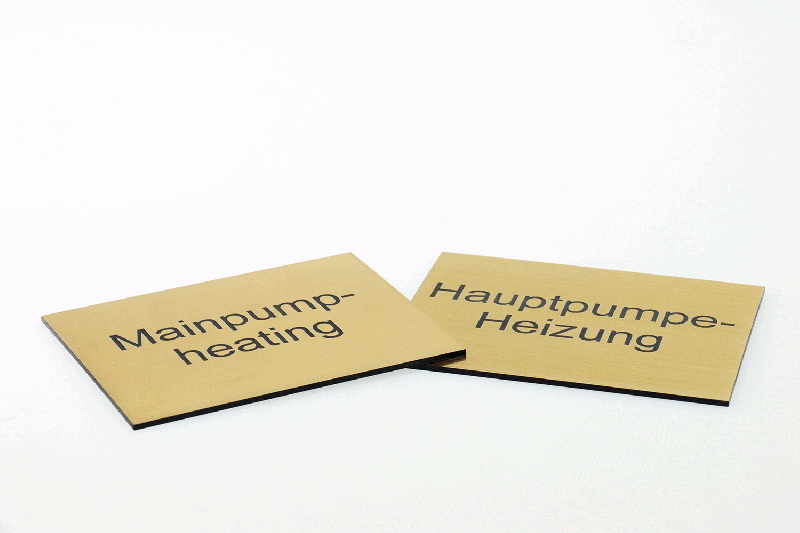 Labels and Signage engraved out of TroPly Metallic Plus